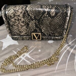 Victoria's Secret snakeskin crossbody with gold chain four pockets and zipper